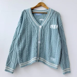 1989 Cardigan in light blue knit with white bird appliqués on the back